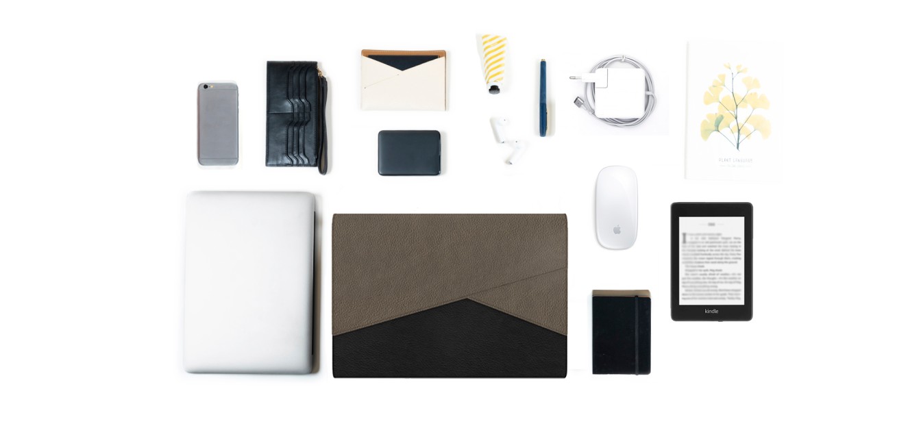 Volt Laptop Sleeve in black leather fits in laptop, phone, wallet & passport case